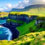 Lush green hills and cliffs of Ireland's coastline.