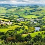 Lush green hills and historic castles in Tipperary.